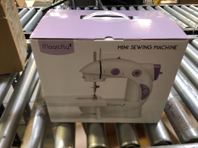 Photo 3 of magicfly mini sewing machine