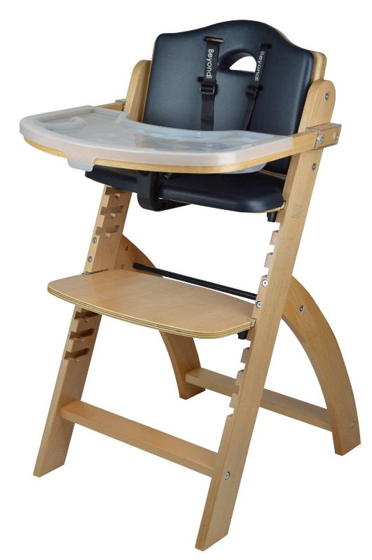 Photo 1 of Abiie Beyond Wooden High Chair with Tray. The Perfect Adjustable Baby Highchair Solution for Your Babies and Toddlers or as a Dining Chair. (6 Months up to 250 Lb) (Natural Wood - Black Cushion)
