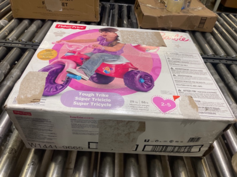 Photo 2 of Fisher-Price Barbie Tough Trike, Toddler Ride-On Toy Tricycle With Storage Compartment