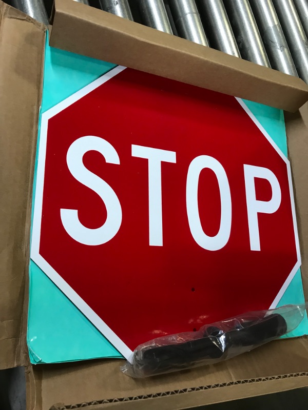 Photo 2 of SmartSign 18 x 18 inch Handheld “STOP - SLOW” Paddle Sign with Handle, Double-Sided, Screen Printed, 120 mil Aluminum Composite, Multicolor 18" Non-Reflective