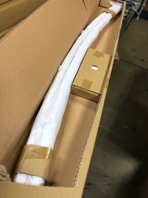 Photo 2 of Amazon Basics Extendable Curved Shower Rod - 48" to 72", White
