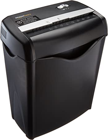 Photo 1 of Amazon Basics 6-Sheet Cross-Cut Paper and Credit Card Home Office Shredder *** ITEM HAS DEBRIS FROM  PRIOR USE ***
