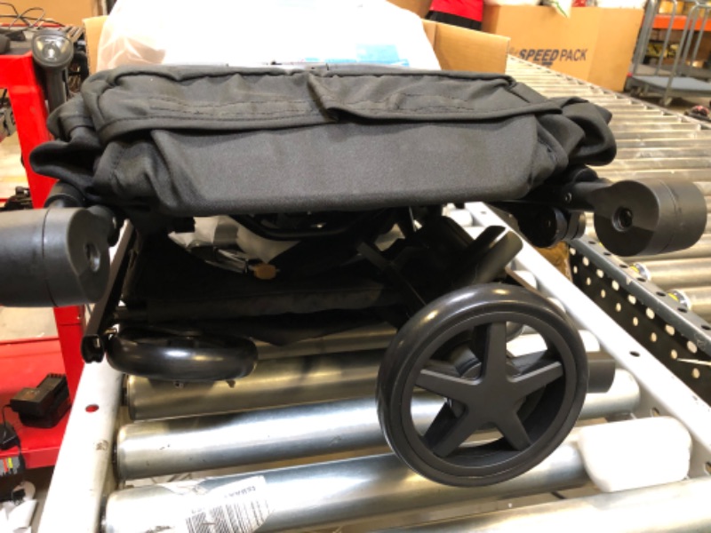 Photo 1 of Mompush Lithe V2 Lightweight Stroller + Snack Tray, Ultra-Compact Fold & Airplane Ready Travel Stroller, Near Flat Recline Seat, Cup Holder, Raincover & Travelbag Included Black