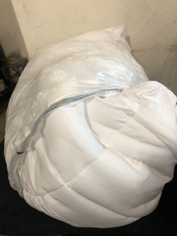 Photo 3 of 60"X80" white comforter 