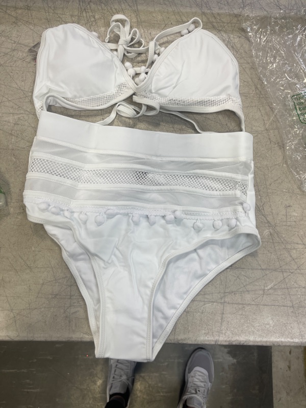 Photo 1 of A WHITE WOMENS TWO PIECE BATHING SUIT SIZE SMALL 