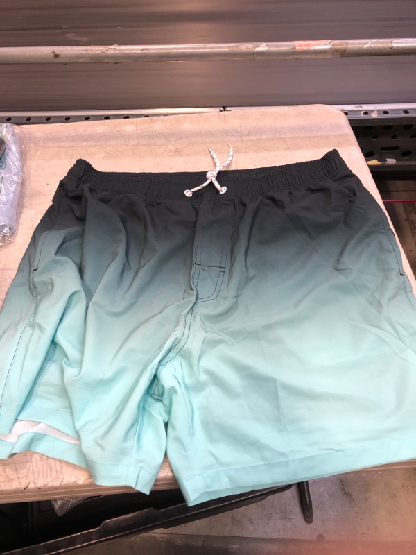 Photo 1 of BLACK AND LIGHT BLUE SWIM SHORTS ( LARGE ) 