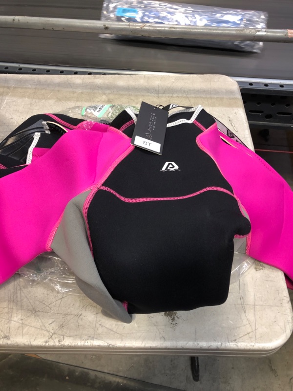 Photo 1 of 8T PINK AND BLACK WET SUIT 