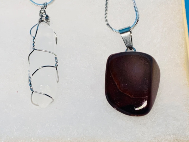 Photo 1 of 892599… 2 polished rock/crystal pendant necklaces on 22” chains in gift box 