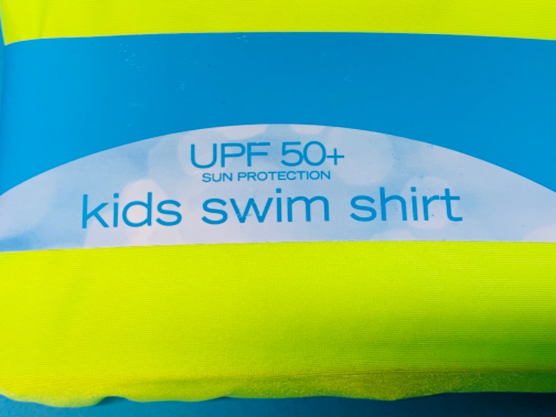 Photo 1 of 892876…  2 kids size large UPF 50+ sun protection long sleeve swim shirts 