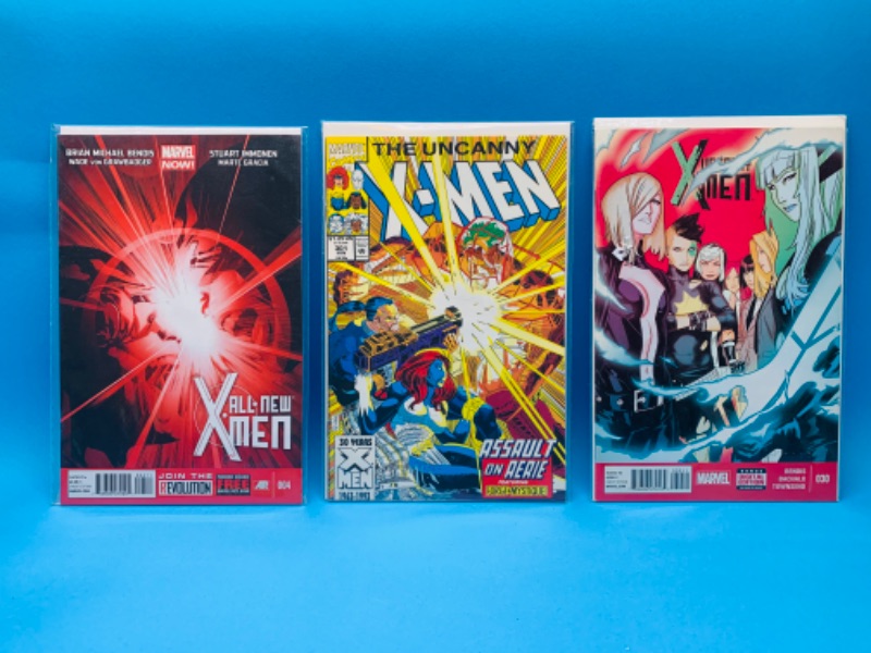 Photo 1 of 892977…3 X-men comics in plastic sleeves