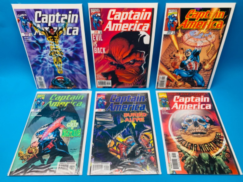 Photo 1 of 892998…6 Captain America comics in plastic sleeves