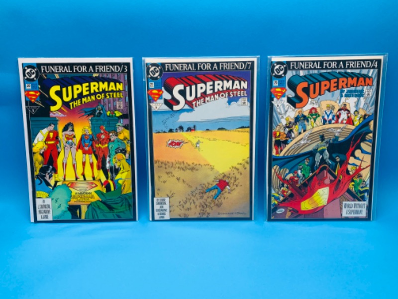 Photo 1 of 893002…3 superman comics in plastic sleeves