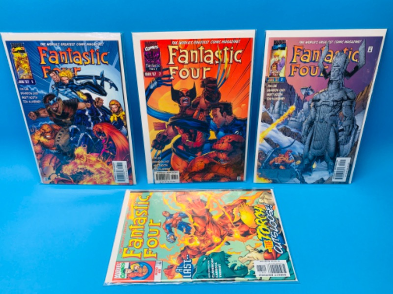 Photo 1 of 893035…4 fantastic four comics in plastic sleeves