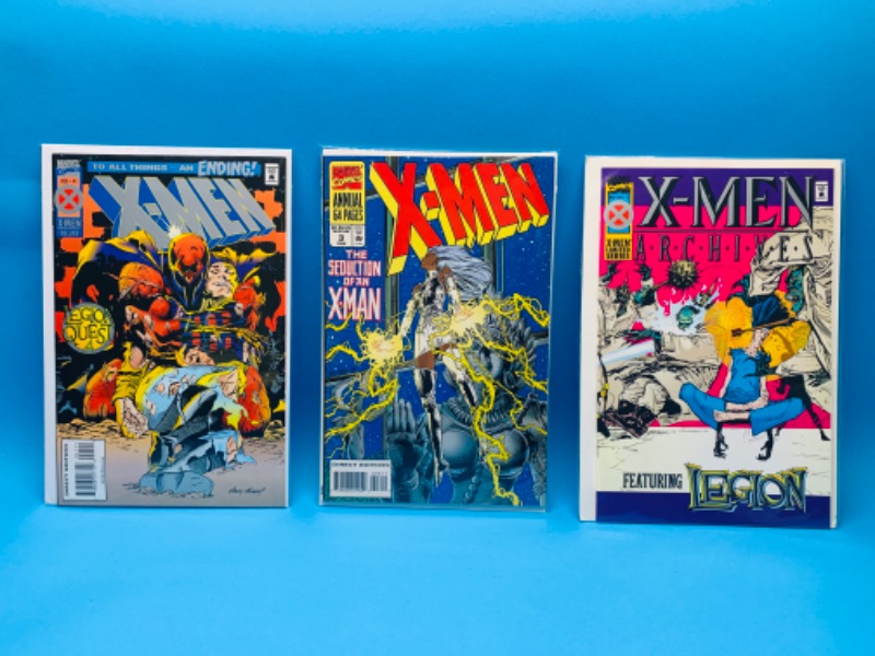 Photo 1 of 893037…3 X-men comics in plastic sleeves