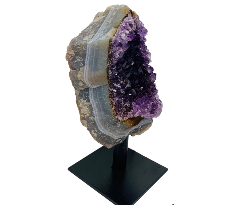 Photo 1 of 893088…4” amethyst rock on stand- height includes stand