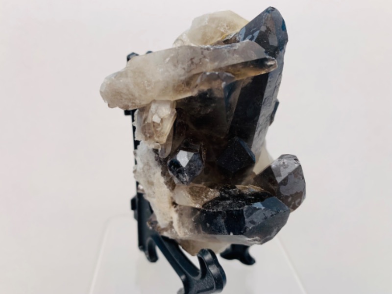 Photo 2 of 893102…3.5” smokey quartz rock on stand