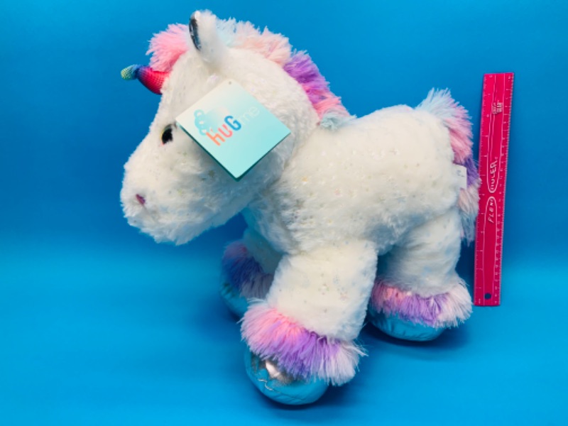 Photo 1 of 893364…large hug me unicorn plushy 