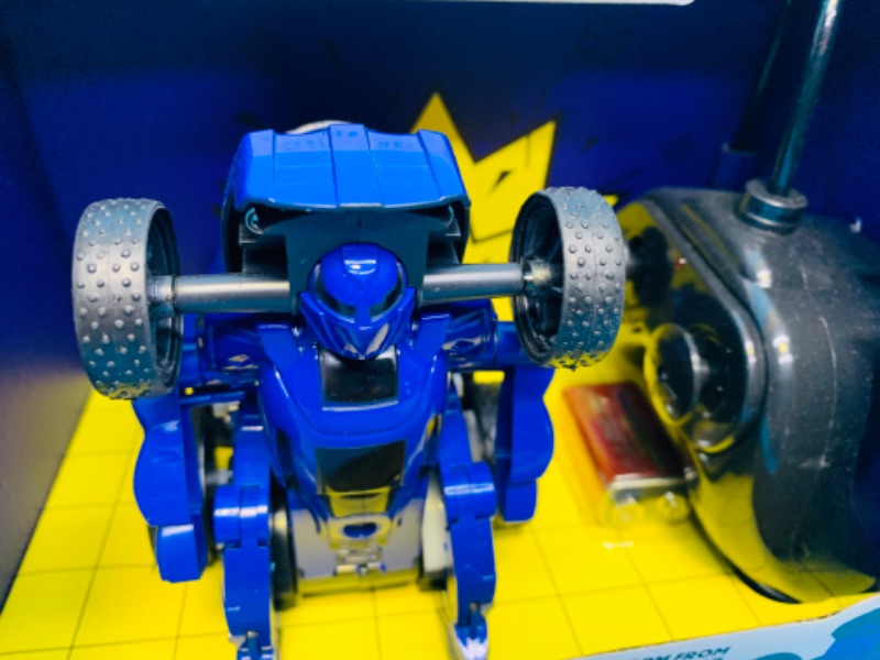 Photo 3 of 893805…Sharper Image remote control robot racer- transforming robot 