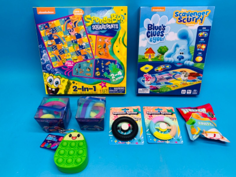Photo 1 of 894022…sponge Bob, blues clues, and fidget games 