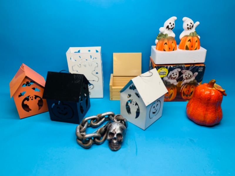 Photo 1 of 894135…used Halloween tins, candle holders and more