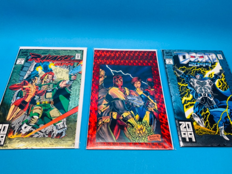 Photo 2 of 894360…3 foil covers #1 comics in plastic sleeves 