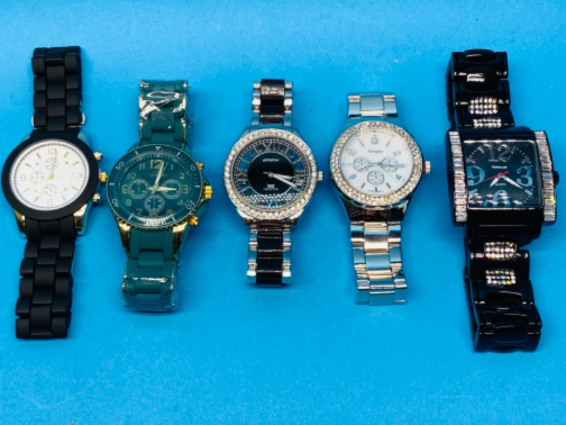 Photo 1 of 894513…5 mens fashion watches- will need batteries replaced 