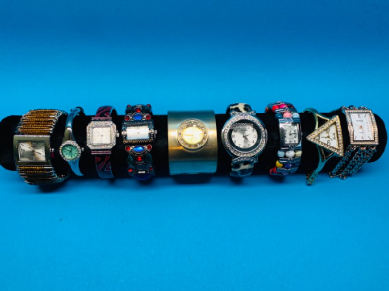 Photo 1 of 894518…9 ladies fashion cuff watches- will need batteries replaced 