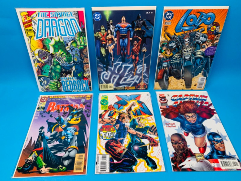 Photo 1 of 894562…6  comics in plastic sleeves 