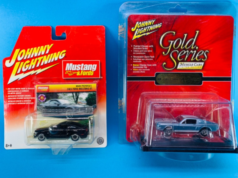 Photo 1 of 894704… 2 Johnny Lightning die cast Ford Mustang GT cars 