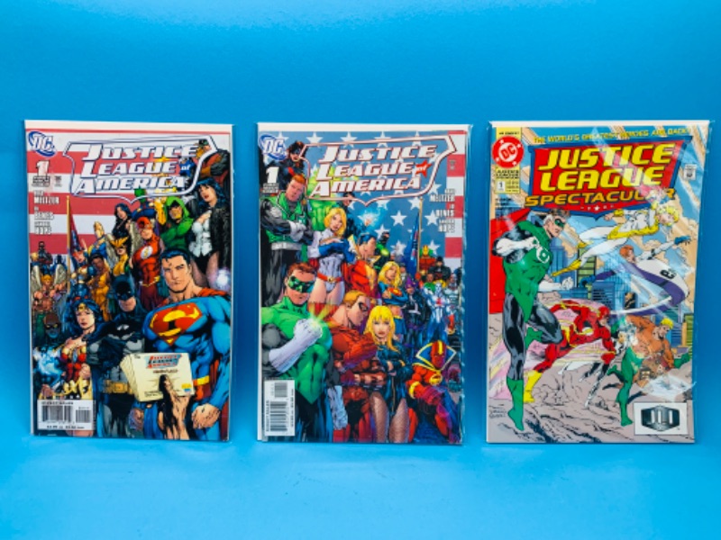 Photo 1 of 894764…3 justice league comics all #1’s in plastic sleeves 
