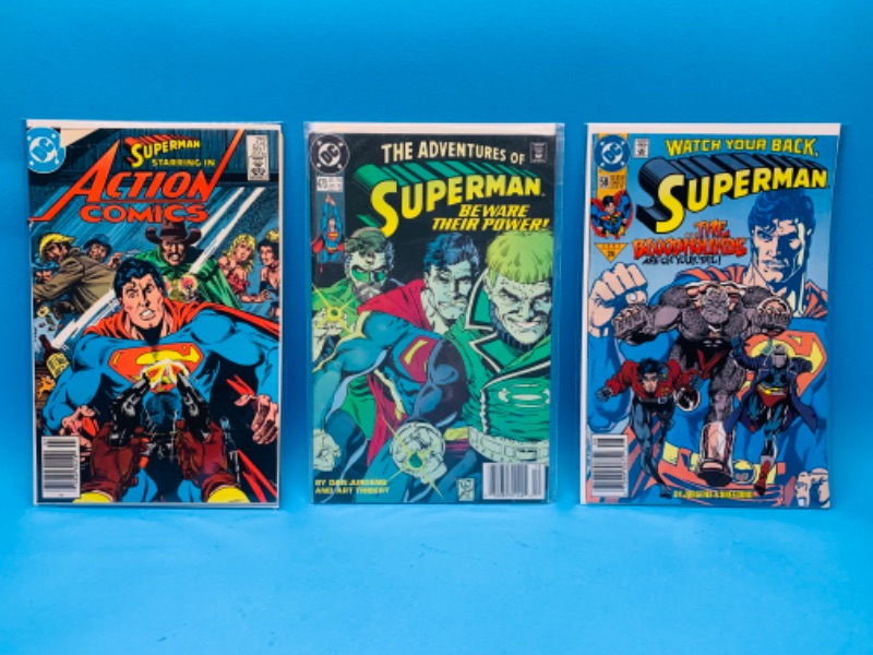 Photo 1 of 894808…3 older Superman  comics in plastic sleeves 