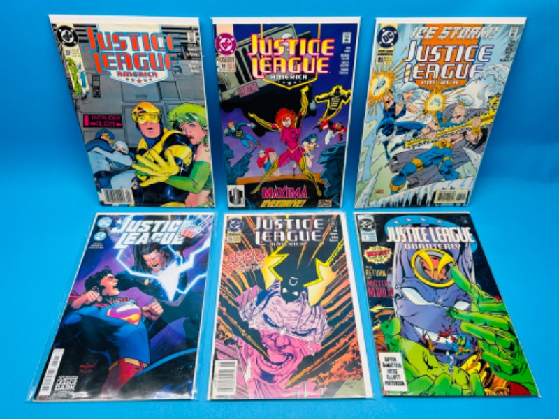 Photo 1 of 894874…6 vintage justice league comics in plastic sleeves 