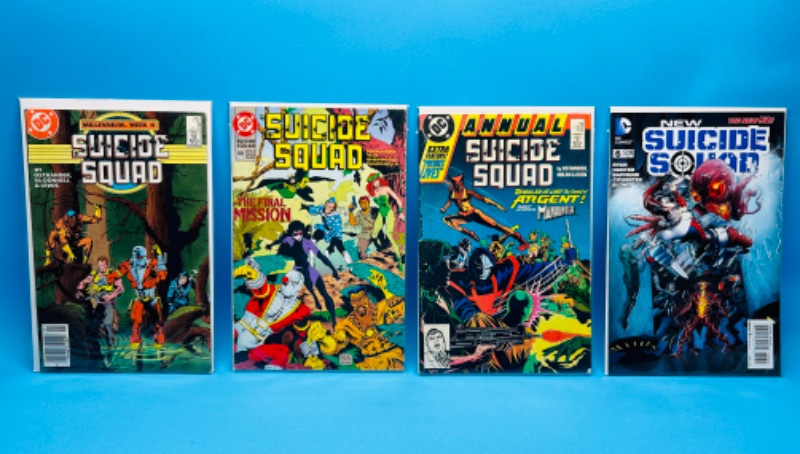 Photo 1 of 894886…4 older suicide squad  comics in plastic sleeves 