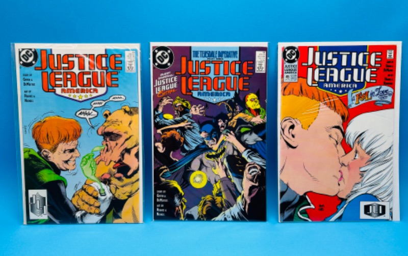 Photo 1 of 894900… 3 vintage justice league comics in plastic sleeves 