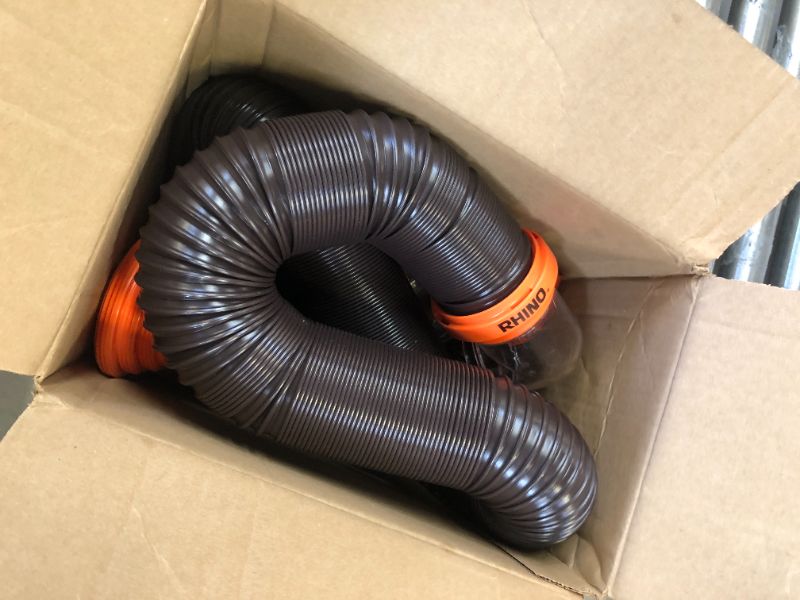 Photo 2 of Camco RhinoFLEX RV Sewer Hose Kit with Swivel Transparent Elbow and 4-in-1 Dump Station Fitting, Brown, 15 Feet (39770) 15ft Sewer Hose Kit Frustration-Free Packaging