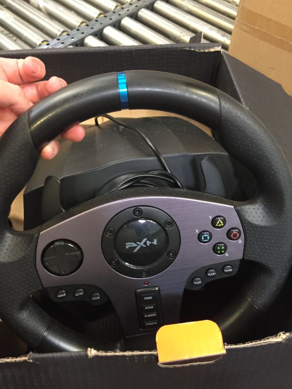 Photo 1 of Force Feedback Steering Wheel