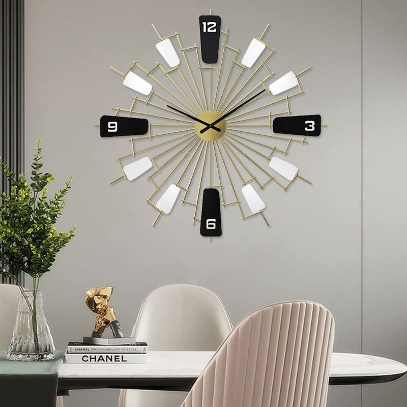 Photo 1 of 27.6 Inch Metal Mid Century Wall Clock for Living Room Decor, Silenced & Minimalism Wall Clocks Battery Operated Quartz, Golden Wall Clock Perfect Wall Art for Living Room, Home, Hotel, Office