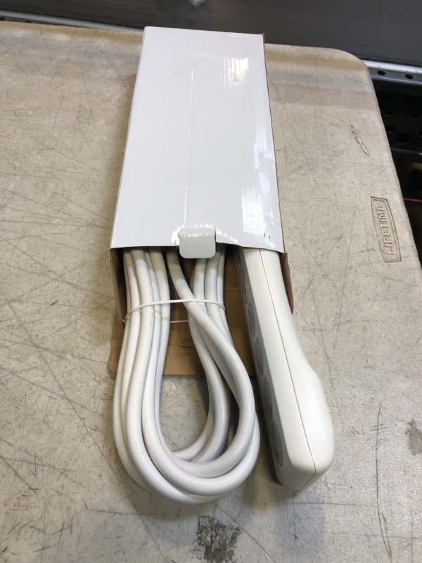 Photo 1 of GE 6-Outlet Surge Protector, 15 Ft Extension Cord, Power Strip, 800 Joules, Flat Plug, Twist-to-Close Safety Covers, Protected Indicator Light, UL Listed, White, 50768 White 15 ft 1 Pack