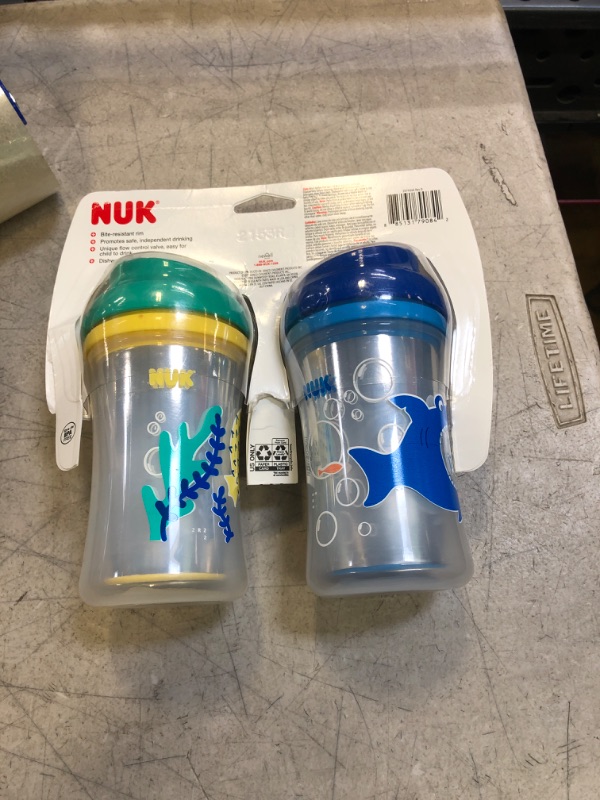 Photo 1 of First Essentials by NUK Hard Spout Sippy Cup, 10 oz., 2-Pack, Assorted Colors Clouds & Stars