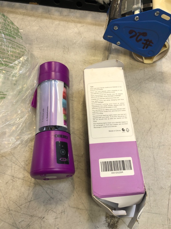 Photo 1 of  PURPLE PORTABLE  BLENDER 