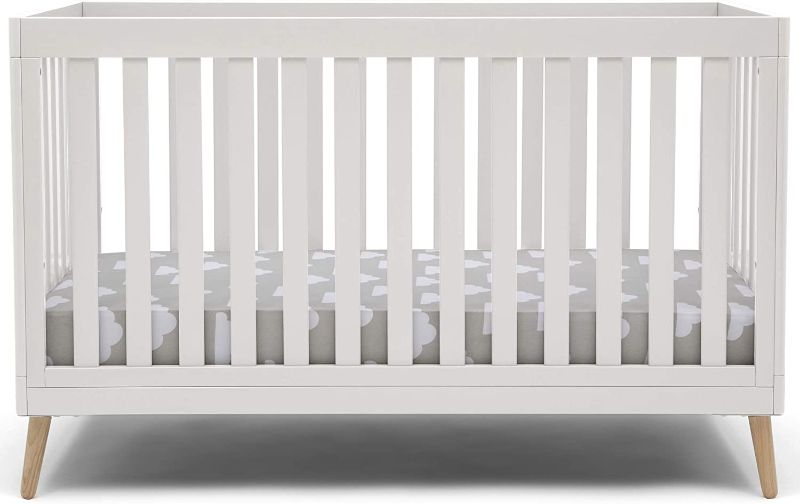 Photo 1 of Delta Children Essex 4-in-1 Convertible Baby Crib, Bianca White with Natural Legs
