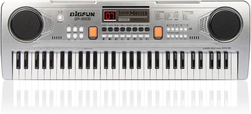 Photo 1 of BIGFUN Keyboard Piano for Kids, 61Key Multifunction Electric Piano Keyboard Educational Instrument Toy for 3 4 5 6 7 8 9 10 11 12 Years Old Boys and Girls with Microphone…
