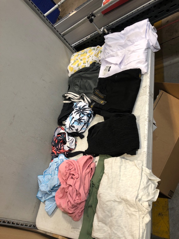 Photo 1 of 12Pcs bag of clothes all different sizes and miscellaneous items 