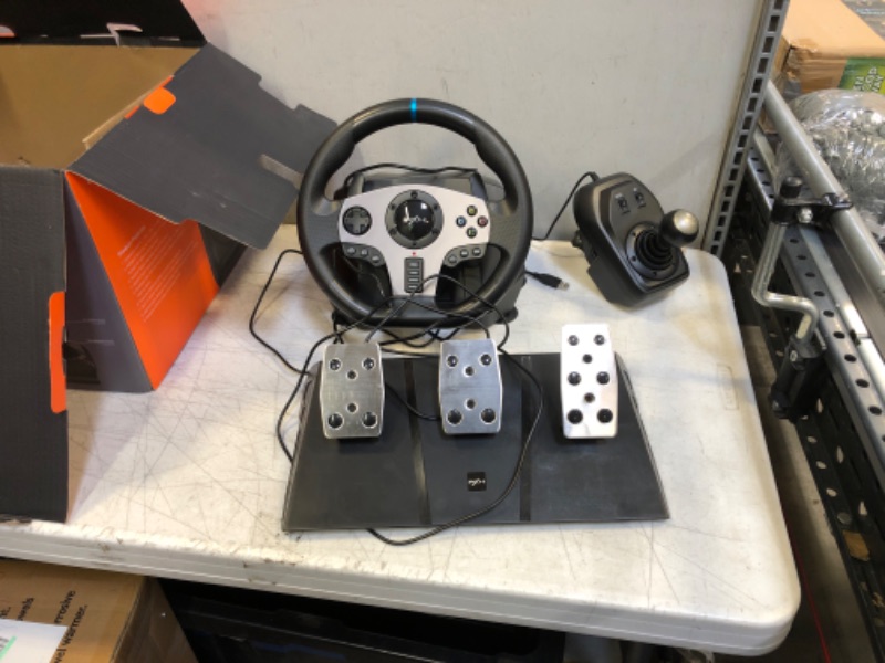 Photo 1 of Game Racing Wheel, PXN V9 270°/900° Adjustable Racing Steering Wheel, with Clutch and Shifter, Support Vibration and Headset Function, Suitable for PC, PS3, PS4, Xbox One, Nintendo Switch.