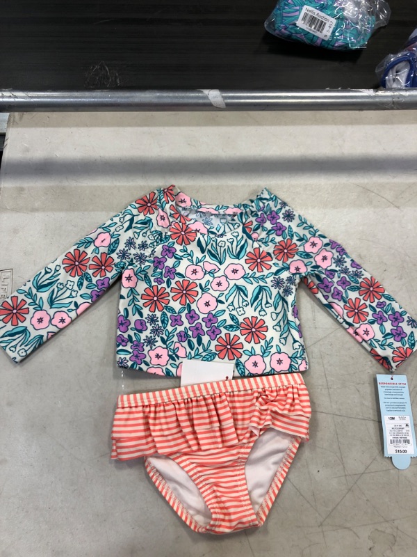 Photo 1 of Baby Girls' 2pc Floral Print Long Sleeve Ruffle Rash Guard Set - Cat & Jack 12M,