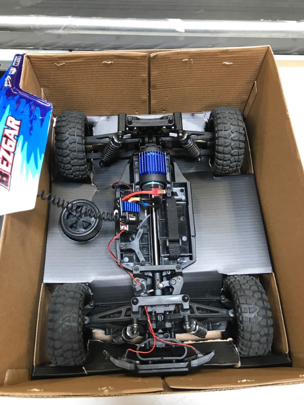 Photo 3 of BEZGAR HM124 Brushless RC Car - 1:12 Scale 52+KM/H High Speed RC Truck, 4x4 Offroad Waterproof for All Terrains, Hobby Grade Remote Control Truck for Adults and Kids Boys with 3 Rechargeable Batteries White-blue (USED) (UNABLE TO TEST) (MISSING PARTS)