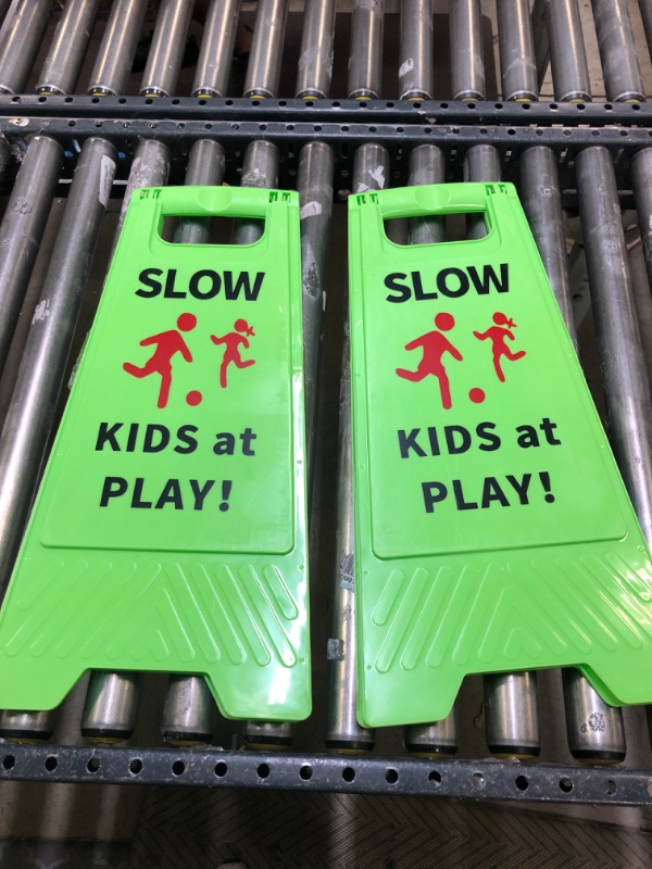 Photo 2 of Slow Kids at Play Sign, Children at Play Safety Signs with Double-Sided Text and Graphics for Street Neighborhoods Schools Park Sidewalk Driveway (2-Pack Green)