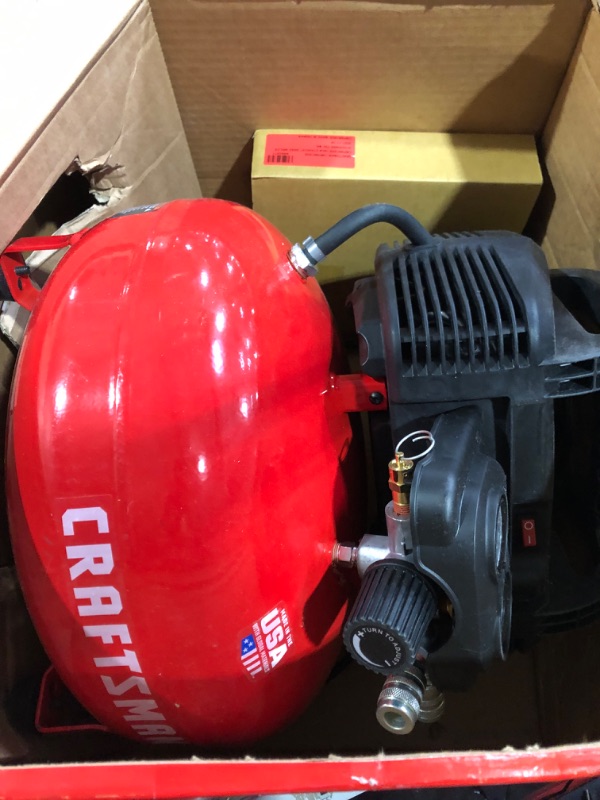 Photo 2 of ***USED - NO NOZZLES INCLUDED - POWERS ON***
Craftsman Air Compressor, 6 Gallon, Pancake, Oil-Free with 13 Piece Accessory Kit (CMEC6150K)