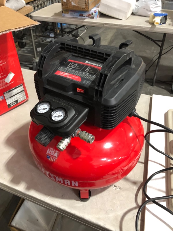 Photo 4 of ***USED - NO NOZZLES INCLUDED - POWERS ON***
Craftsman Air Compressor, 6 Gallon, Pancake, Oil-Free with 13 Piece Accessory Kit (CMEC6150K)