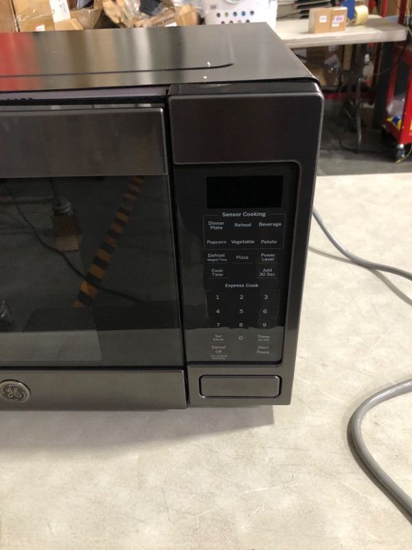 Photo 5 of ***MAJOR DAMAGE - SEE COMMENTS***
GE JES1657BMTS Microwave Oven, Black Stainless Steel, 13.625 in